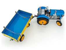 Traktor ZETOR mit dem Anhänger – metallen Disken